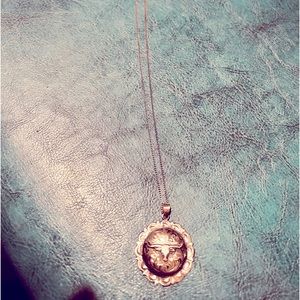 Sterling silver necklace with a steer head pendant.